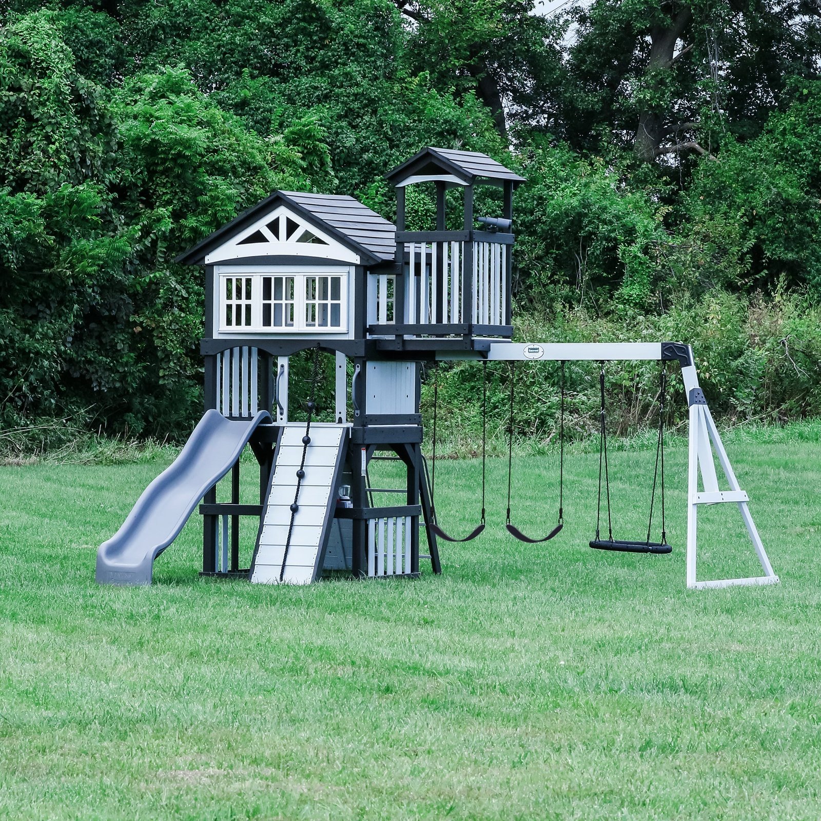 2300262-WHISPERING-HERO.jpg Whispering Point Swing Set - Image 1